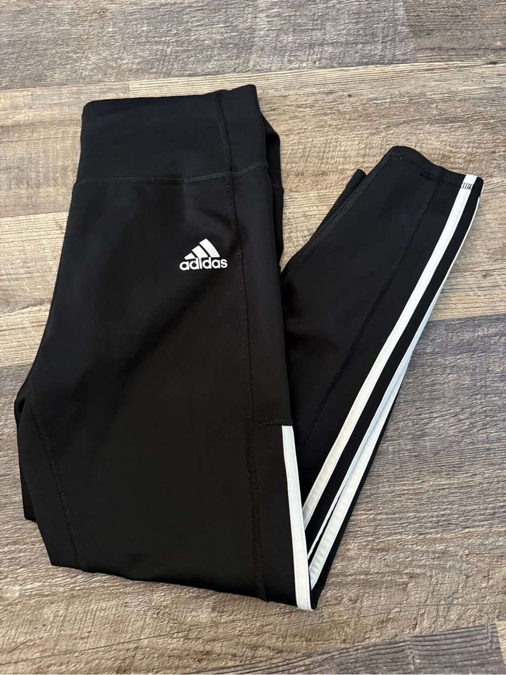 Adidas Black woman Athletic Leggings with White Stripes size m  12-14